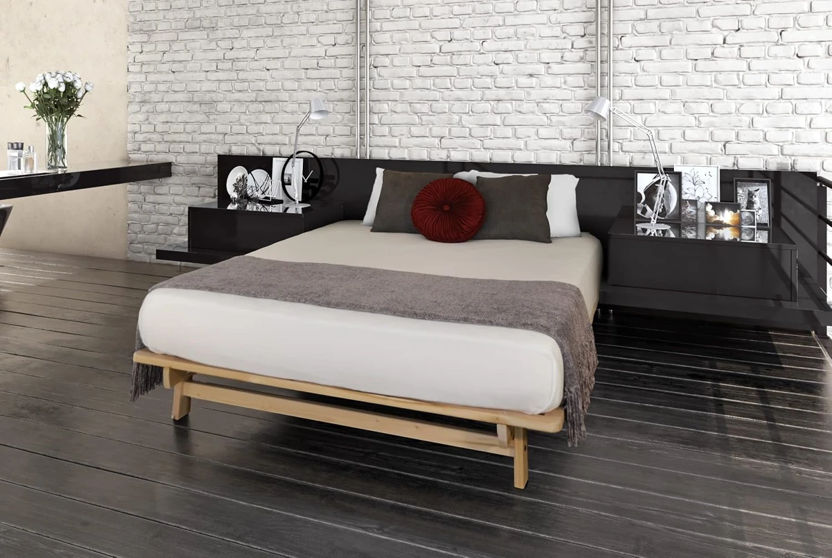Low unfinished-poplar KD Frames Ekko Twin bed with inset legs, styled with a separate mattress and bedding