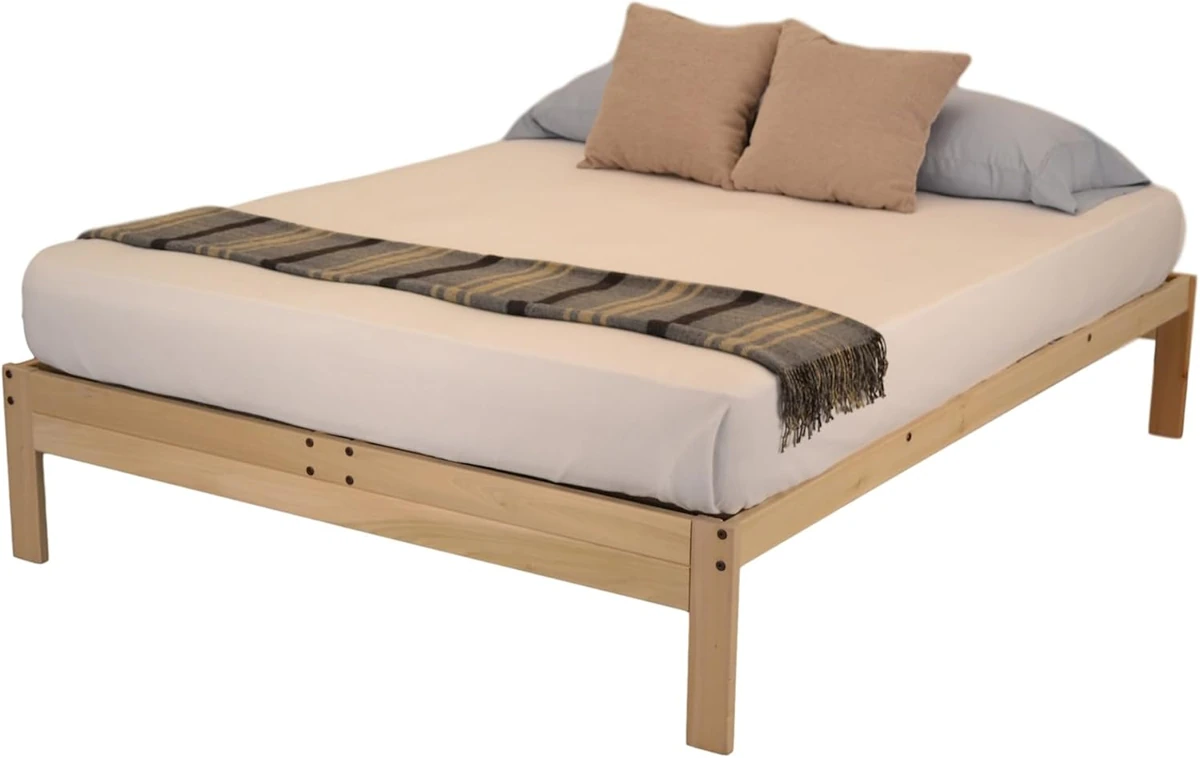 Unfinished solid-poplar KD Frames Nomad Queen platform bed shown with a separate mattress and bedding